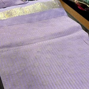This is a beautiful lavender Saree gently used , comes with Readymade  blouse